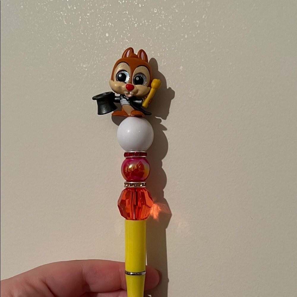 Chipmunk Character Pen with Yellow and Red Accents